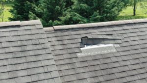 Residential roof with shingle damage.